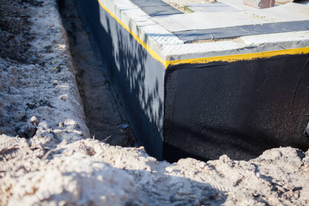 Professional Basement Waterproofing technician working in Twinsburg, OH